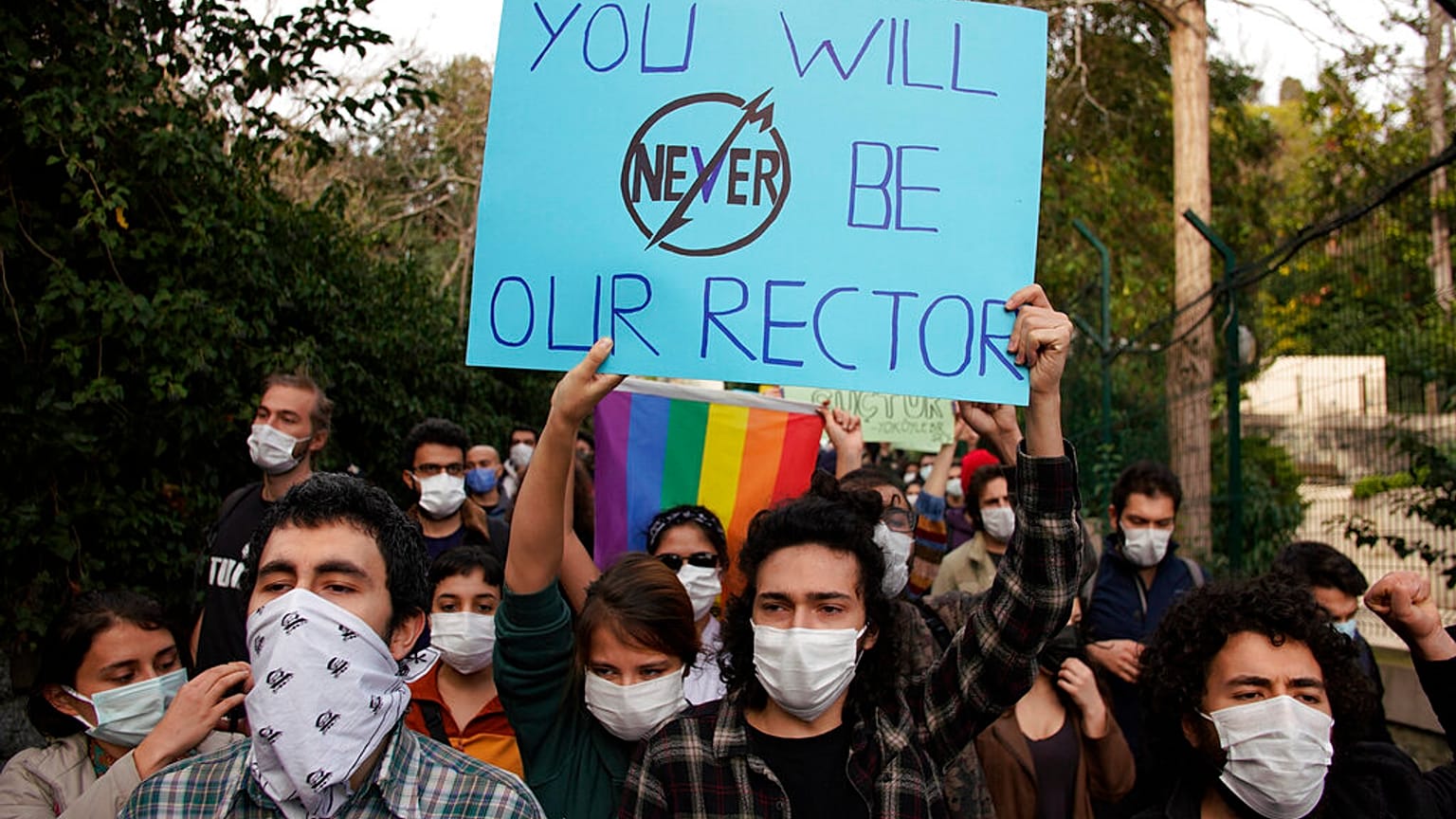 Students of Bogazici University hold placards during a protest in Istanbul, Wednesday, Jan. 6, 2021. 
