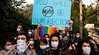 Students of Bogazici University hold placards during a protest in Istanbul, Wednesday, Jan. 6, 2021.