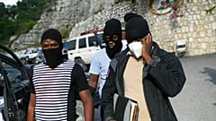 Police officers investigating the assassination of President Jovenel Moise