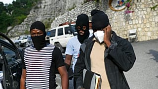 Police officers investigating the assassination of President Jovenel Moise