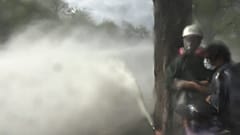 Police firing water canon and tear gas to disperse protesters