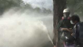 Police firing water canon and tear gas to disperse protesters