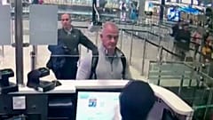 Michael L. Taylor, center, and George-Antoine Zayek at passport control at Istanbul Airport in Turkey, on December 30, 2019.