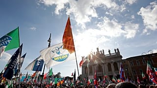 A flag of the Italian League party is seen at a 2019 political rally in Rome.