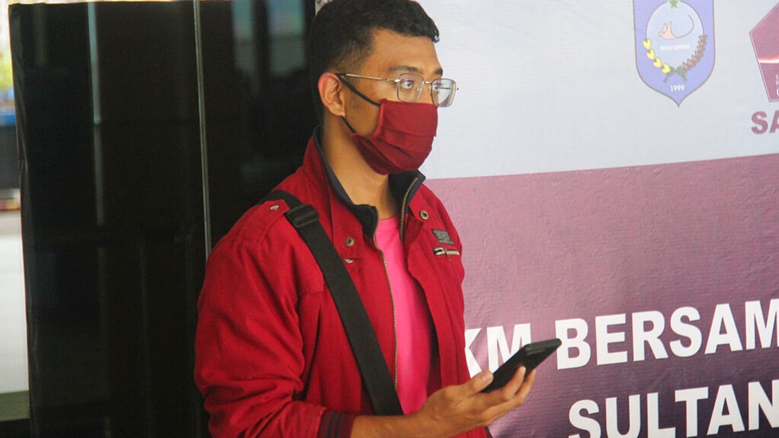 A man who used a fake identity arrives at the Sultan Babullah airport in Ternate, Indonesia.