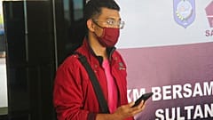 A man who used a fake identity arrives at the Sultan Babullah airport in Ternate, Indonesia.