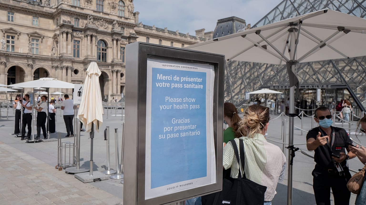 Visitors register for COVID-19 tests at the Louvre museum in Paris.