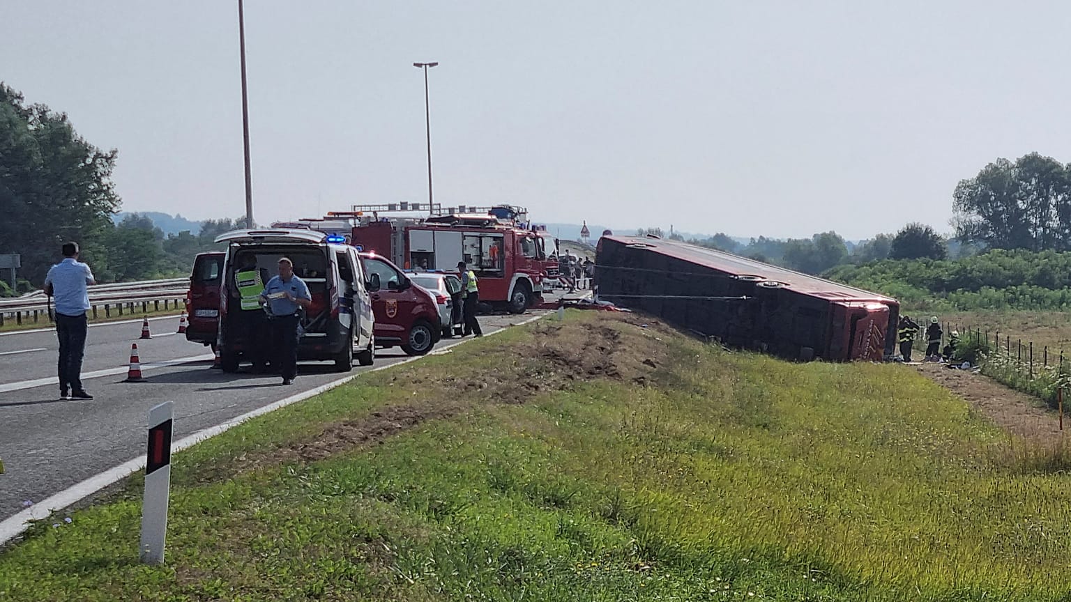Emergency crews work at the site of a bus accident near Slavonski Brod, Croatia
