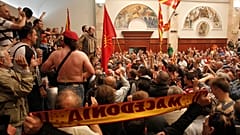 Scores of protesters broke through a police cordon and entered Macedonian parliament in April 2017.