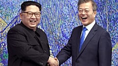 North Korean leader Kim Jong Un (L) and South Korean President Moon Jae-in inside the Peace House at the border village of Panmunjom in Demilitarized Zone, April 28, 2018.