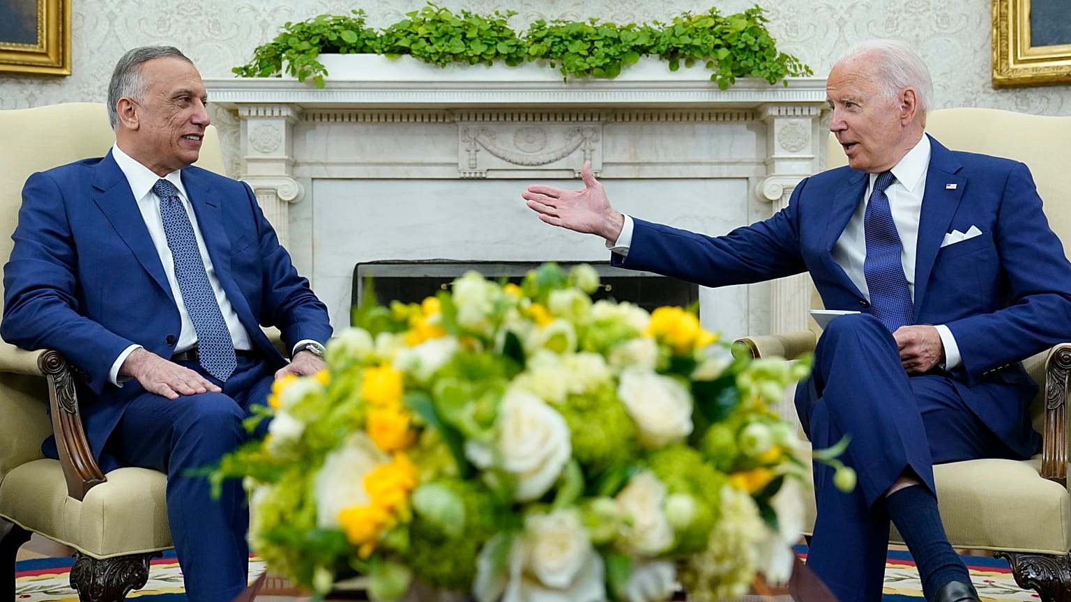 President Joe Biden, right, and Iraqi Prime Minister Mustafa al-Kadhimi during their meeting in the Oval Office of the White House in Washington, July 26, 2021. 