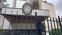 The front entrance of the Cuban Embassy was visibly damaged.