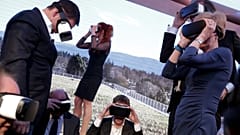 Mark Zuckerberg (centre) and others wear VR headsets at an event in 2016