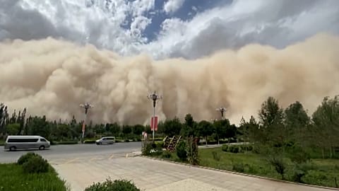 Sandstorm engulfing streets.