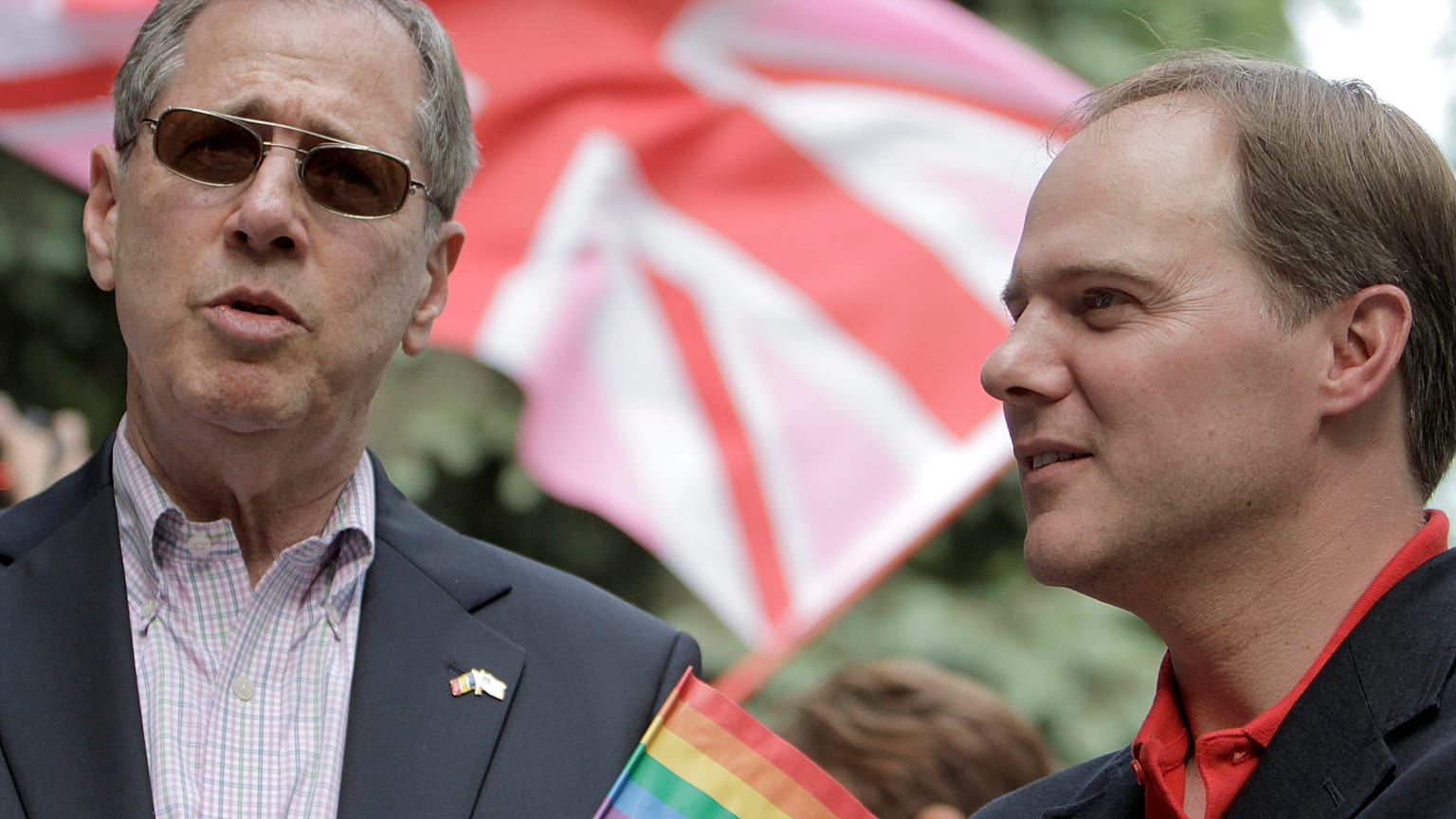 FILE: U.S. Ambassador to Romania Mark Gitenstein, left, speaks to UK Ambassador to Romania, Martin Harris, right, during the Gay Parade in Bucharest, Romania in 2011 