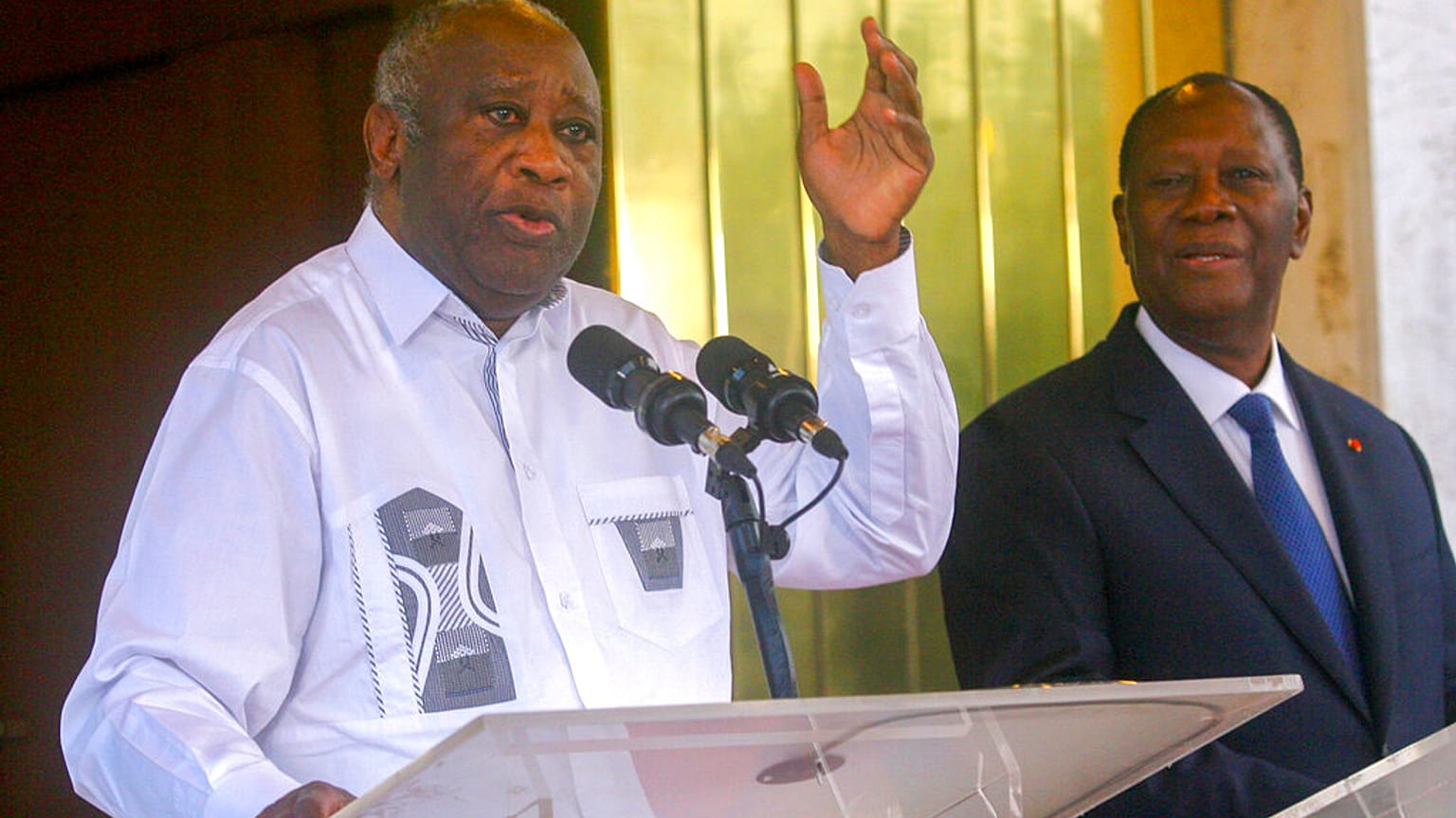 L'ancien président ivoirien Laurent Gbagbo et son successeur encore au pouvoir Alassane Ouattara au palais présidentiel d'Abidjan, 28 juillet 2021