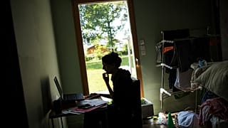 A woman works from home in Vertou, outside Nantes, France