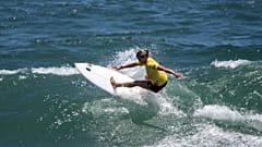 Tsurigasaki Surfing Beach: France's Pauline Ado rides a wave during women's Surfing at Tokyo 2020