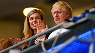 British Prime Minister Boris Johnson and his wife Carrie watch the Euro 2020 soccer championship final between England and Italy at Wembley stadium in London.