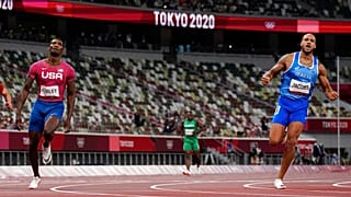 Lamont Jacobs, right, of Italy, celebrates after winning the men's the 100-meter final at the 2020 Summer Olympics, Sunday, Aug. 1, 2021, in Tokyo.
