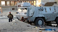 FILE - Photo posted by the Islamic State Group in Sinai shows a deadly attack by militants