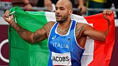 Lamont Marcell Jacobs, of Italy, celebrates after winning the final of the men's 100-meters at the 2020 Summer Olympics, Sunday, Aug. 1, 2021, in Tokyo. 