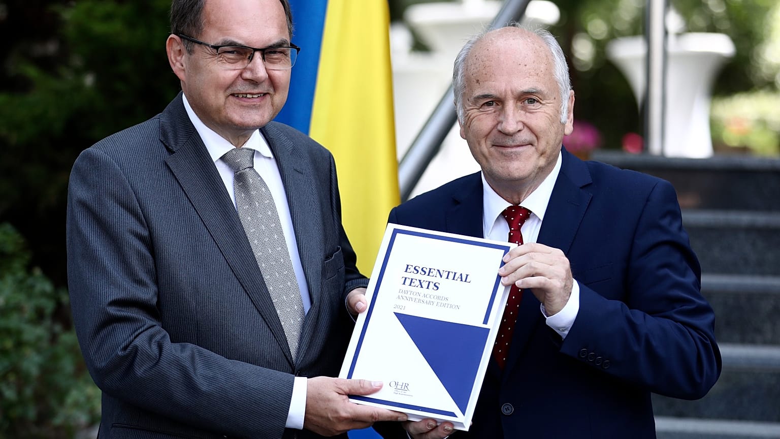 Christian Schmidt, new head of Bosnia's Office of the High Representative or OHR (L) with Valentin Inzko, during a ceremony Sarajevo, Bosnia, Aug. 2, 2021.