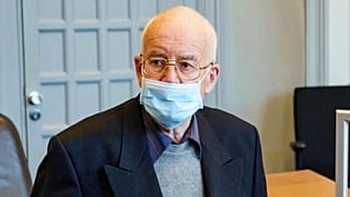 FILE - In this May 28, 2021 file photo a 84-year-old, accused of possession of a tank, waits in the courtroom for the start of the trial in Kiel, Germany.