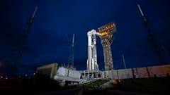 A United Launch Alliance Atlas V rocket with Boeing's CST-100 Starliner spacecraft aboard stands on the launch pad ahead of the Orbital Flight Test-2 mission.