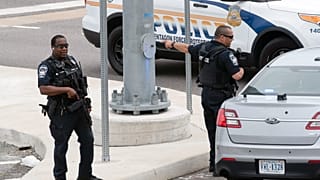 Police secure a parking lot outside the Pentagon Metro area Tuesday, Aug. 3, 2021, at the Pentagon in Washington.