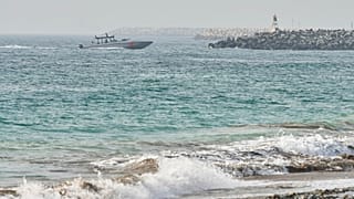 An Emirati Coast Guard vessel patrols off Fujairah, United Arab Emirates, Wednesday, Aug. 4, 2021.