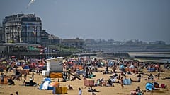 Sunbathers take advantage of the fine weather on the beach on the coast at Margate, east of London on May 31, 2021.