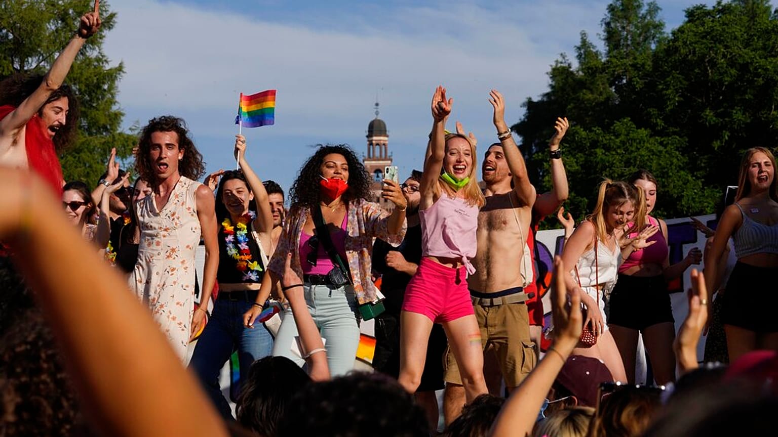 People take part in the annual Pride march, in Milan, Italy, Saturday, June 26, 2021