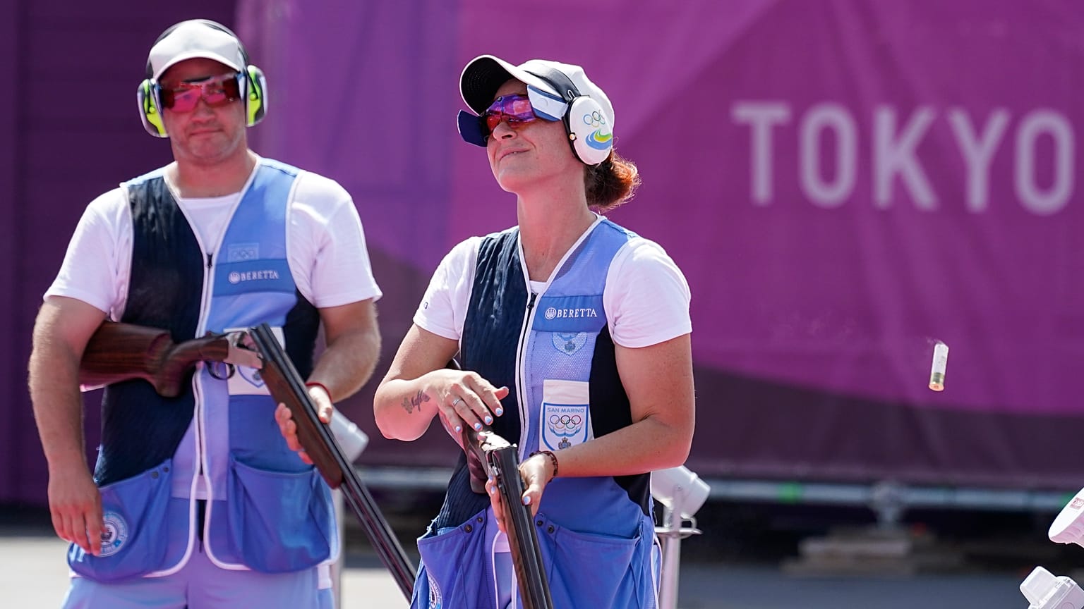 Gian Marco Berti, left, Alessandra Perilli, both of San Marino won silver in the mixed team trap at the Tokyo 2020 Summer Olympics .