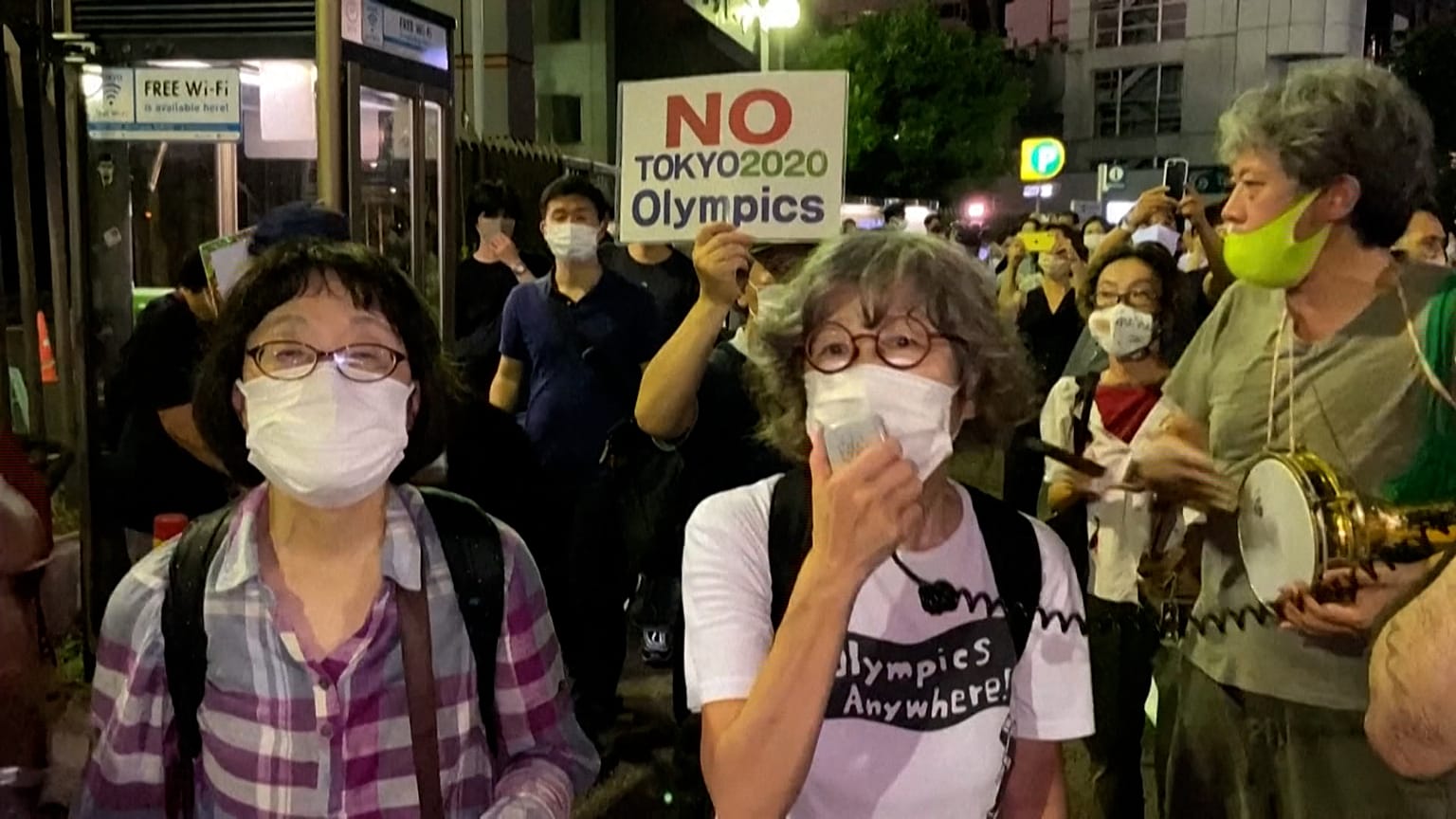 Anti-Olympics protesters gather outside Tokyo stadium