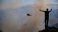 Trabajos de extinción de incendios en Mugla, Turquía
