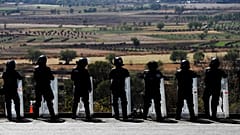 Police are battling a pandemic of violence in Michoacan state, Mexico. 