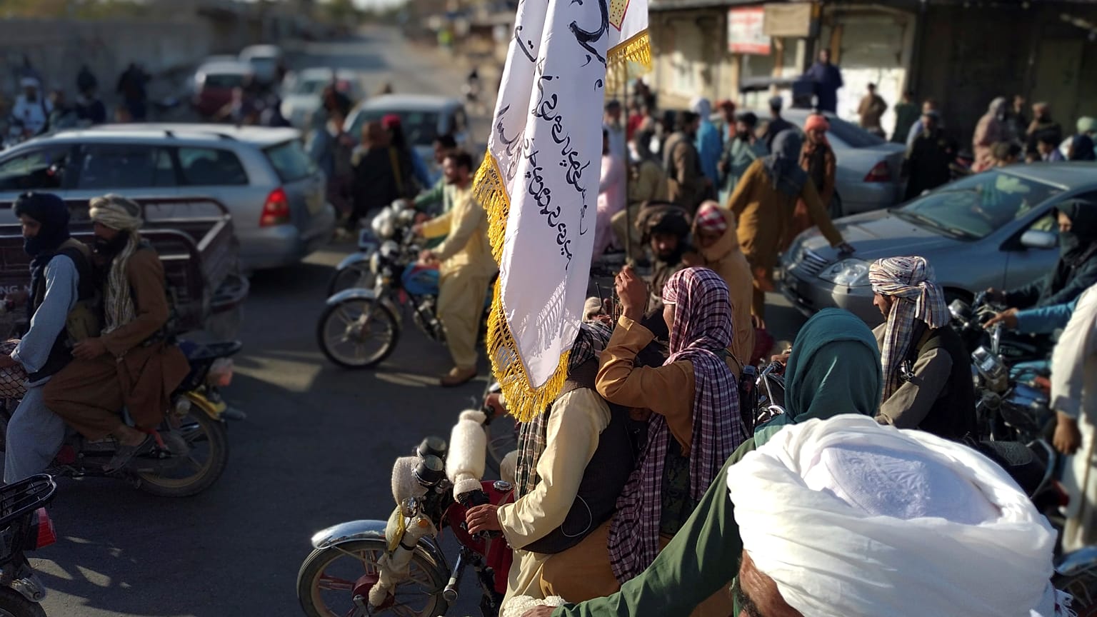 Taliban fighters are seen inside the city of Farah, capital of Farah province southwest of Kabul, Afghanistan