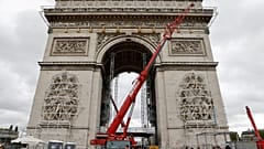 The Arc de Triomphe, home to the the tomb of the Unknown Soldier, being prepared before the wrapping of the monument, as part of a tribute for late bulgarian artist Christo.