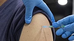 A man gets his vaccination with the Johnson & Johnson vaccine at the district vaccination center in Ludwigsburg, southern Germany, on August 3, 2021.