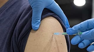 A man gets his vaccination with the Johnson & Johnson vaccine at the district vaccination center in Ludwigsburg, southern Germany, on August 3, 2021.
