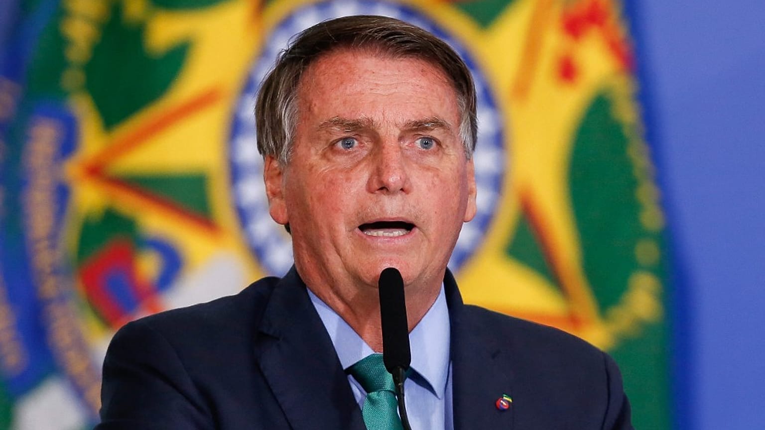In this file photo taken on August 05, 2021 Brazil's President Jair Bolsonaro speaks during a ceremony at the Planalto Palace in Brasilia. 