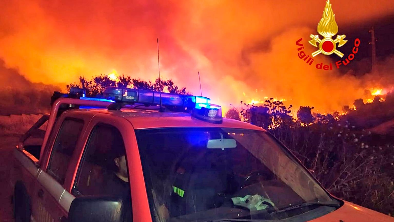 A view of a fire near Mandas, in the south of Sardinia, Italy, in the early hours of Thursday, Aug. 12, 2021