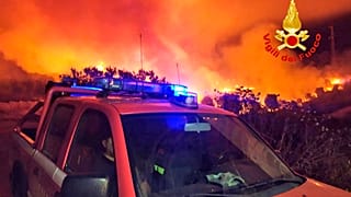 A view of a fire near Mandas, in the south of Sardinia, Italy, in the early hours of Thursday, Aug. 12, 2021