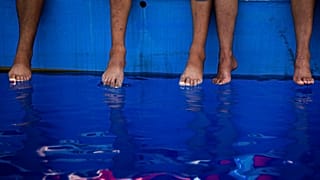 Image d'illustration de migrants dans un bâteau non loin de l'île de Lampedusa, le 29 juillet 2021