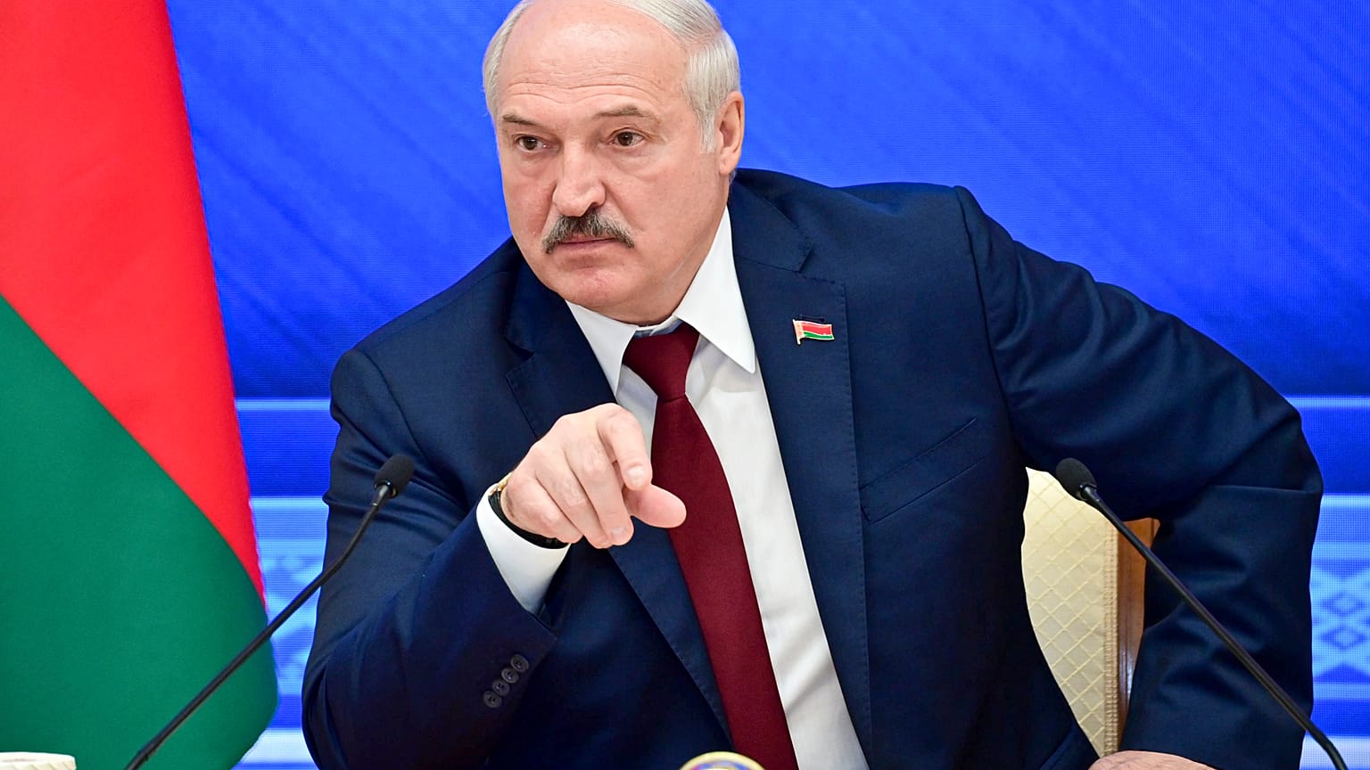 Belarusian President Alexander Lukashenko gestures while speaking during an annual press conference in Minsk, Belarus, Monday, Aug. 9, 2021.