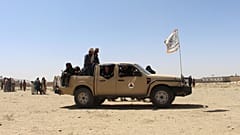 Taliban fighters patrol inside the city of Ghazni, southwest of Kabul
