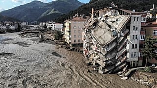 An aerial photo shows destroyed buildings after floods and mudslides killed about two dozens of people, in Bozkurt town of Kastamonu province, Friday, Aug. 13, 2021