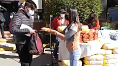 Man getting food after vaccination in El Alto, Bolivia