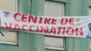 Transparent mit der Aufschrift: "Centre de vaccination"